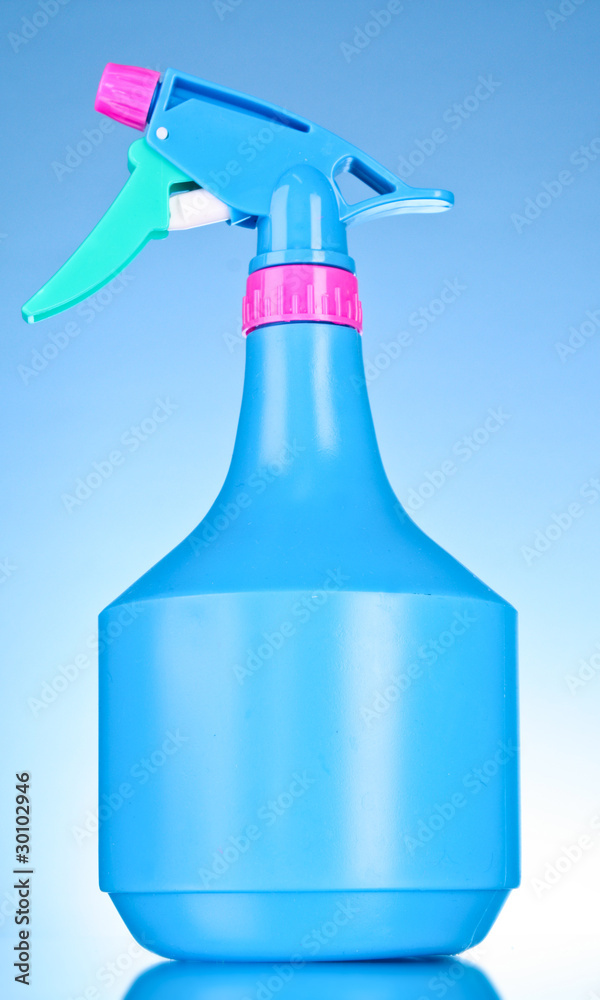blue spray bottle on blue background blue spray bottle on blue background