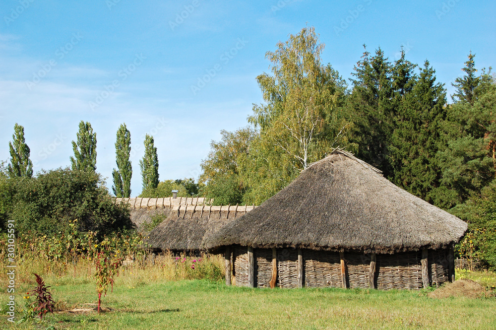 Ancient traditional ukrainian rural barn with a straw roof Ancient traditional ukrainian rural barn with a straw roof