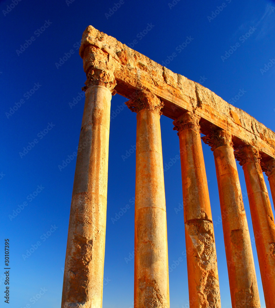 Fototapeta premium Jupiter's temple columns over blue sky