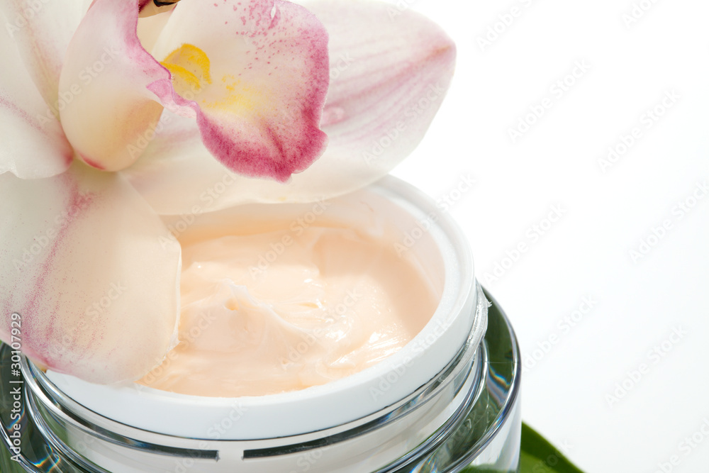 Face cream and orchid flower Face cream and orchid flower