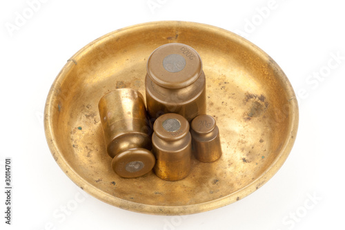 Four brass weigts
