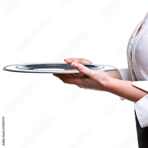 Waitress holding a silver tray isolated on white.