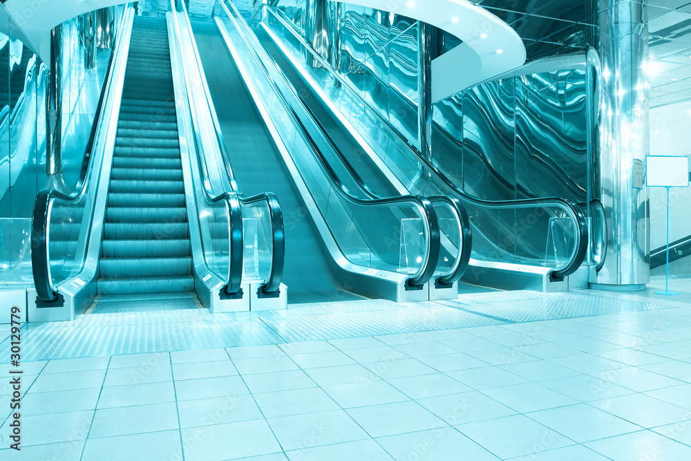 Fototapeta premium motion of blue vanishing escalator