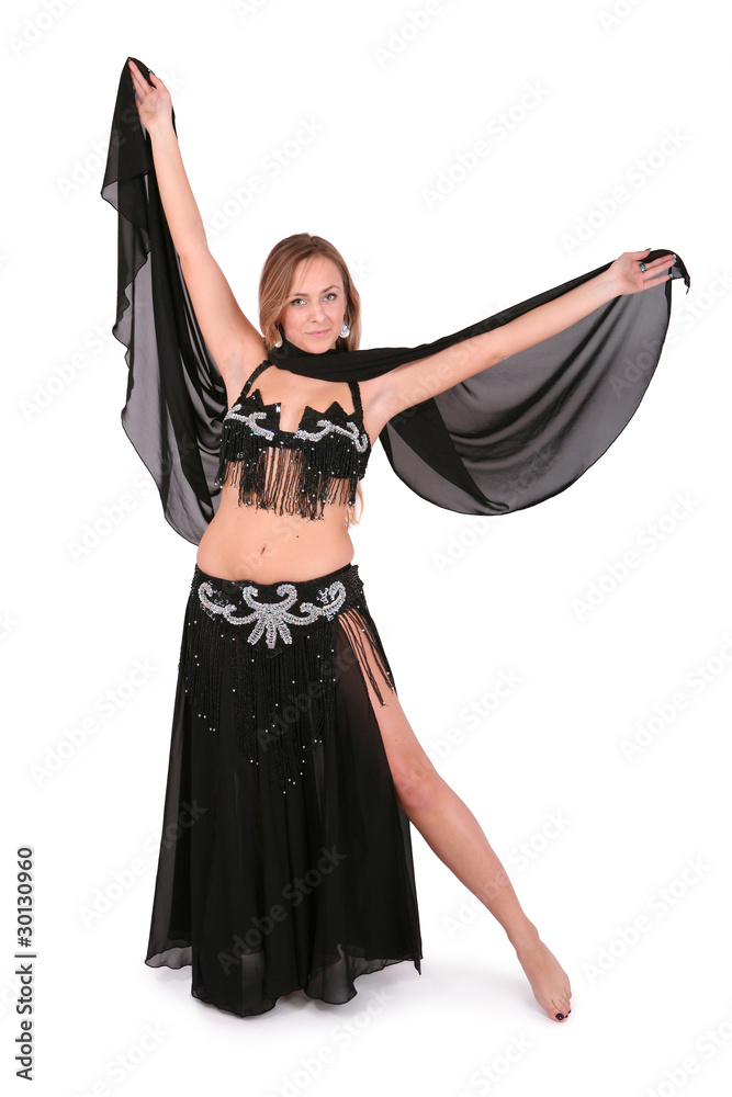 Beautiful belly dancer posing with a veil