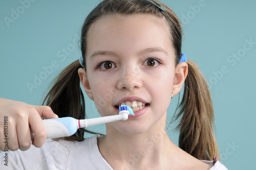 adolescent brushing teeth