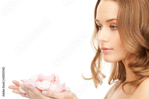 beautiful woman with rose petals