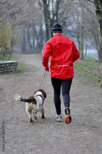 Jogging with the dog in the park