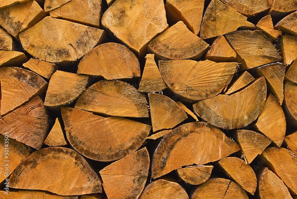 firewood in a stack as a background firewood in a stack as a background