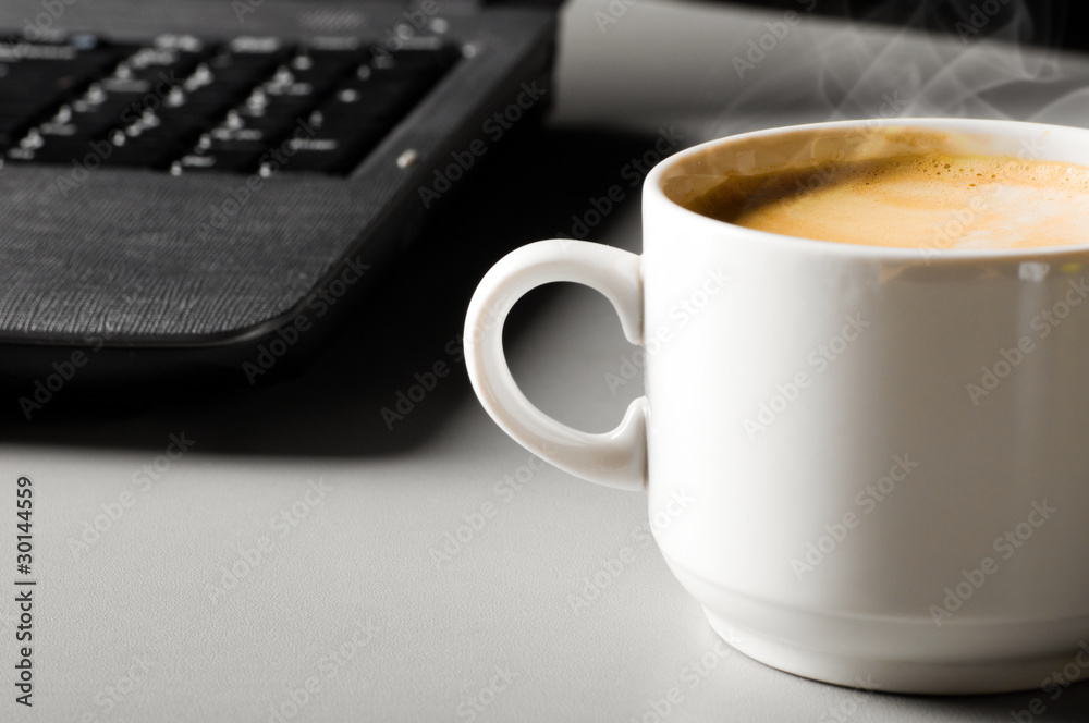 laptop with cup of coffee laptop with cup of coffee