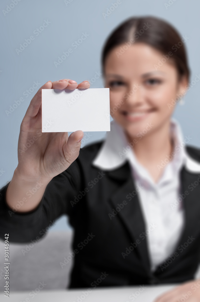 Emotional business woman in office palce show white card Emotional business woman in office palce show white card