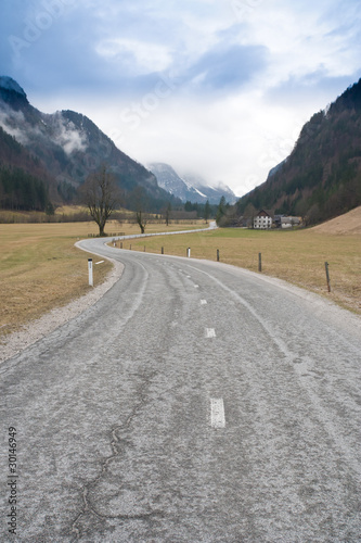curved road in alps photo