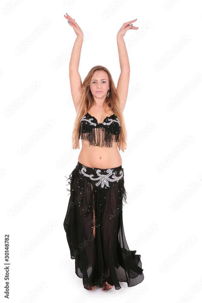 Belly dancer performing with her hands up Belly dancer performing with her hands up