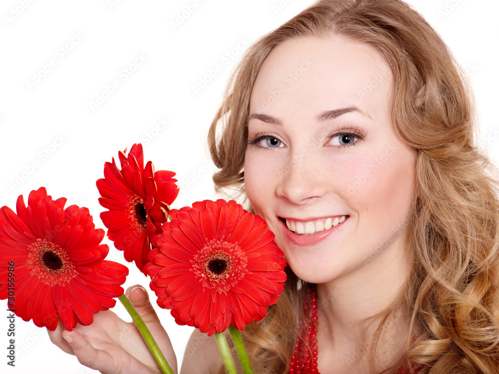 Happy young woman holding flowers. Happy young woman holding flowers.