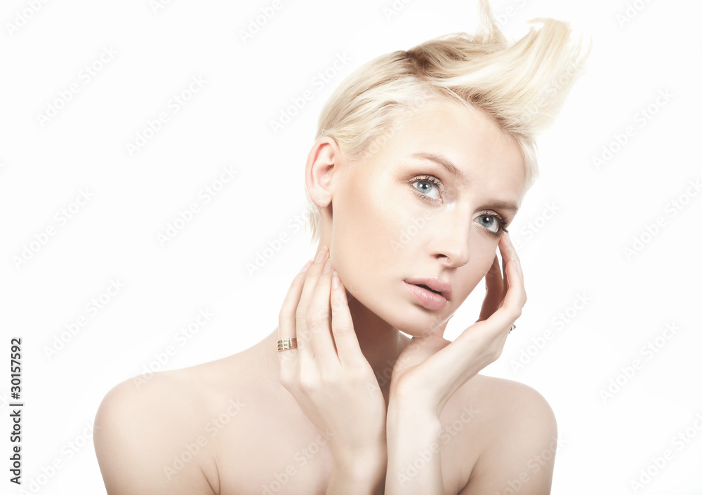 Fototapeta premium Portrait of beautiful female model on white background