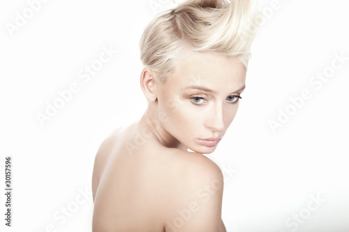 young beautiful blond female with creativity hairstyle