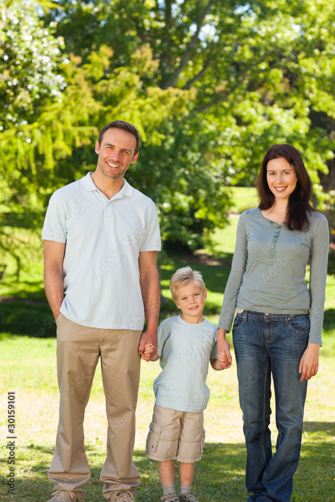 Joyful family in the park Joyful family in the park