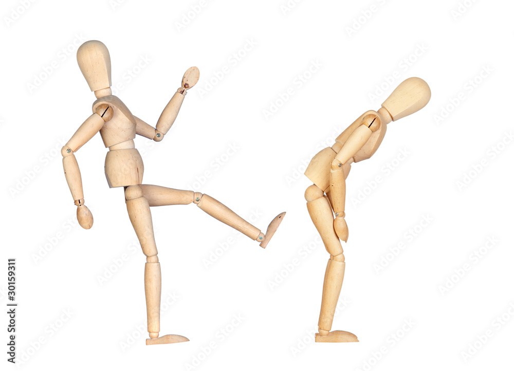Wooden dummy hitting a kick to another Wooden dummy hitting a kick to another