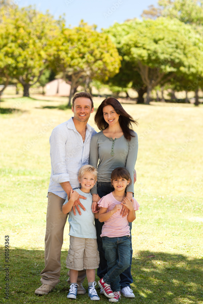 Portrait of a family in the park Portrait of a family in the park