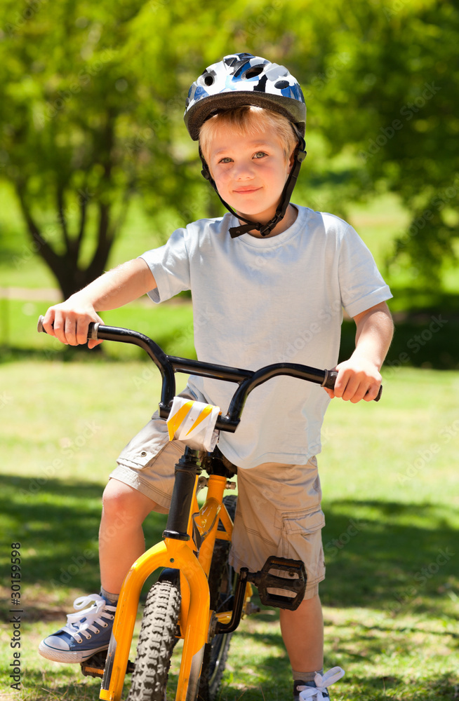 Fototapeta premium Boy with his bike