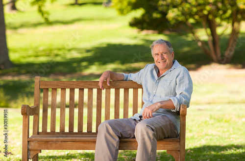 Elderly man sitting on a bench © WavebreakMediaMicro