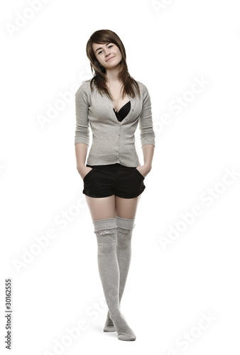 Young, beautiful woman posing in studio