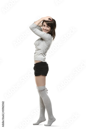 Young, beautiful woman posing in studio