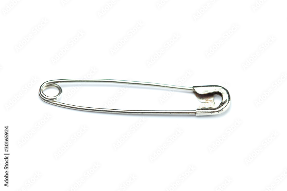 safety pin is isolated on a white safety pin is isolated on a white