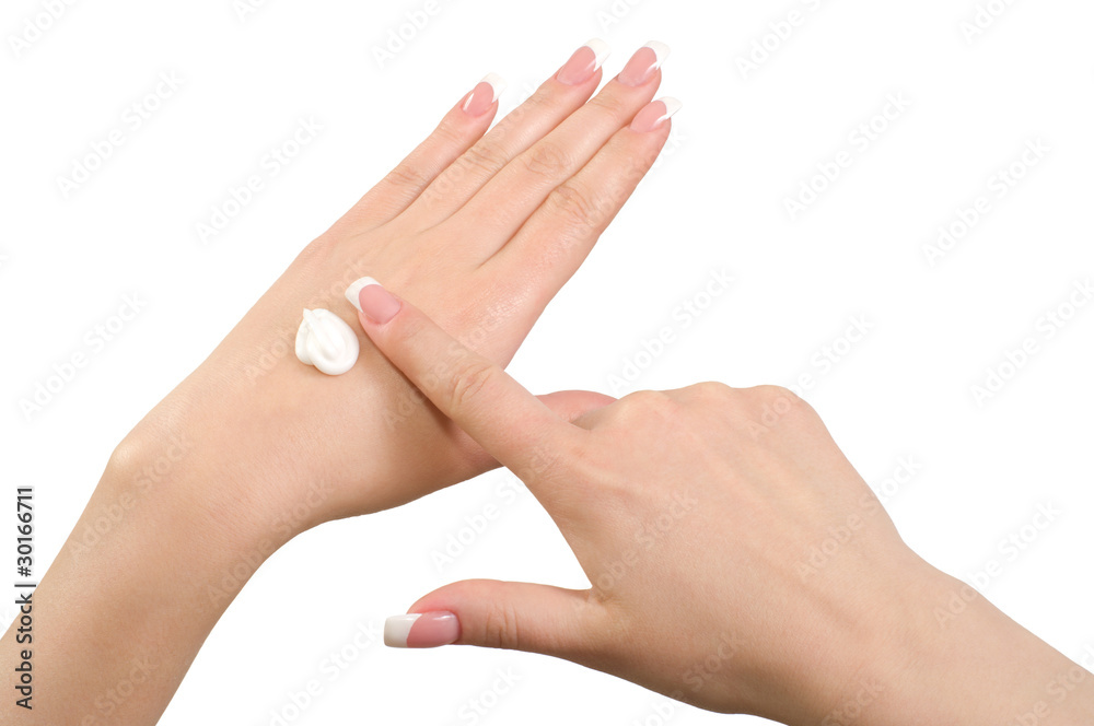 Applying hand cream. Applying hand cream.