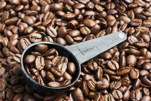 Coffee Beans in Measurement Spoon
