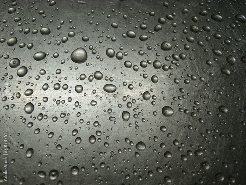 Water drops on an iron surface.