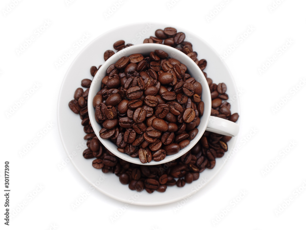 Obraz premium White cup filled with coffee beans