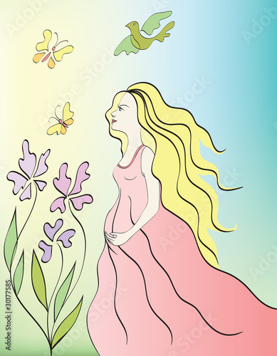 young pregnant woman in the garden