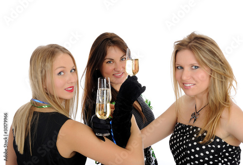 three beautiful woman with glasses of champagne celebrating on p photo