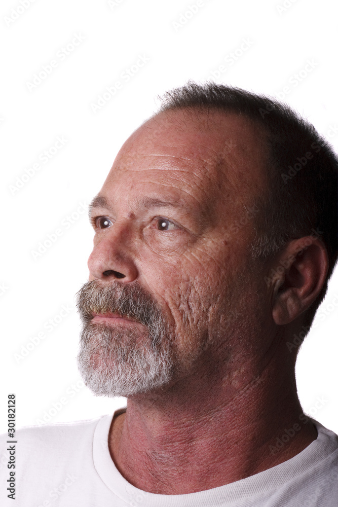 Fototapeta premium Oler Man with Gray Beard and Mustache Looking at Window Light