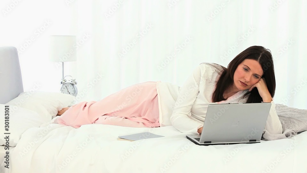 Middle aged woman using a laptop Middle aged woman using a laptop