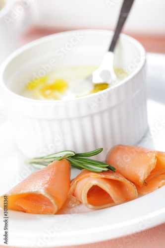 Breakfast with baked eggs and salmon