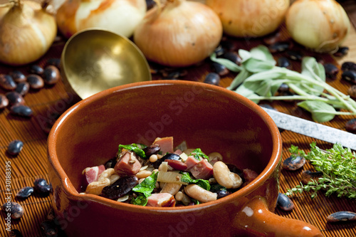 mixture of beans with smoked meat photo