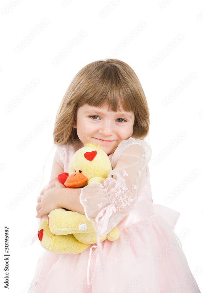 four-year girl in a beautiful pink dress with a toy. four-year girl in a beautiful pink dress with a toy.