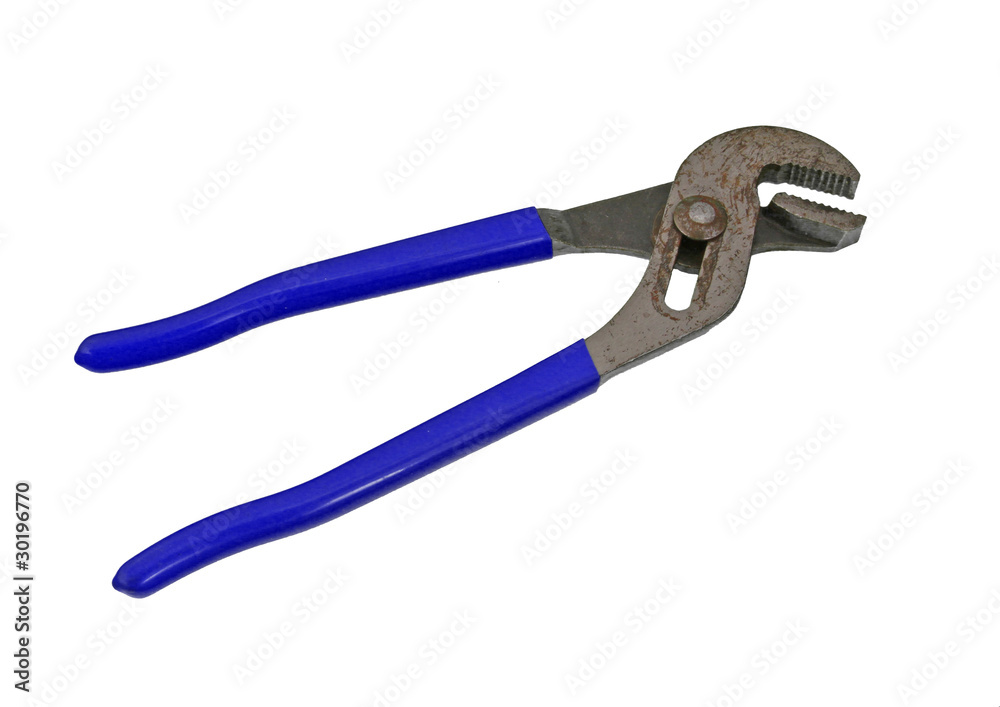 Old adjustable wrench on a plain white background. Old adjustable wrench on a plain white background.