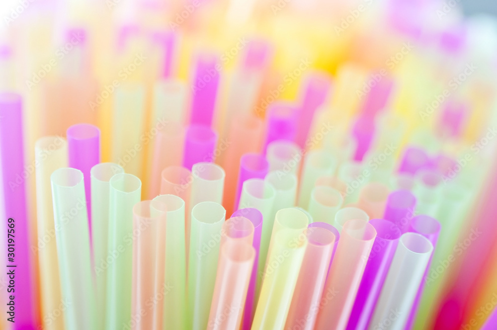 Plastic drinking straws in shallow focus Plastic drinking straws in shallow focus