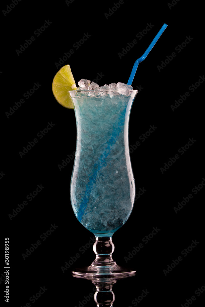 Blue Hawaiian cocktail on a black Blue Hawaiian cocktail on a black