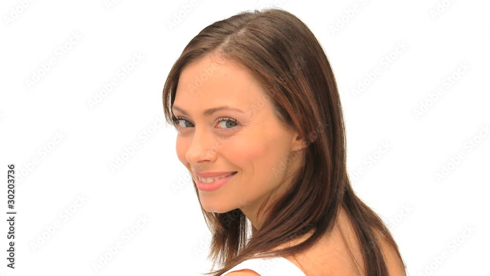Smiling brunette looking at the camera Smiling brunette looking at the camera