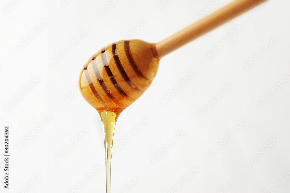 wooden dipper and honey