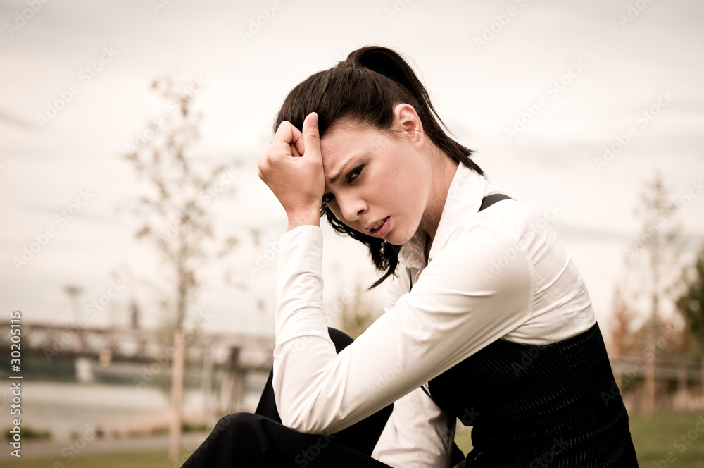 Headache - young business woman