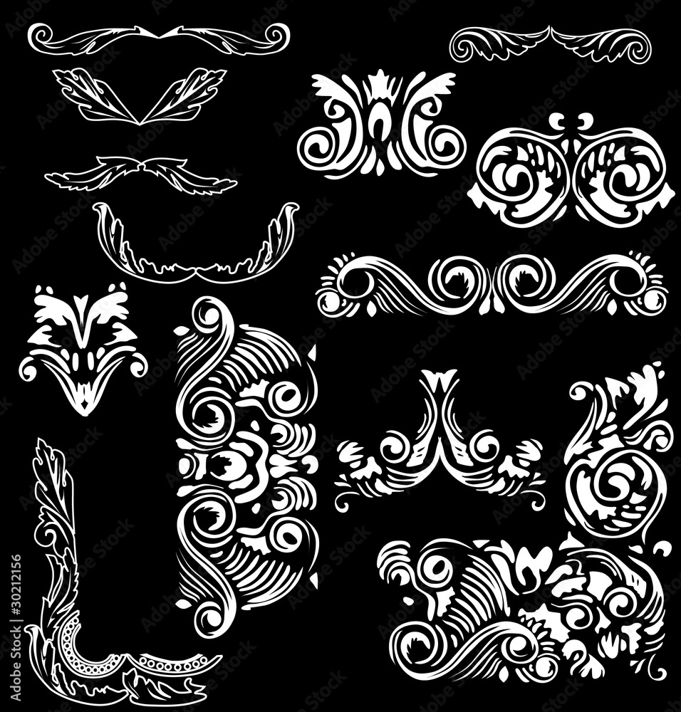 white silhouettes of curled ornaments