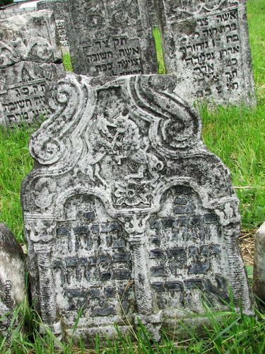 Jewish gravestone in ancient cemetery in Ukraine photo