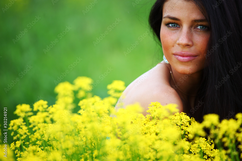 woman on oilseed field woman on oilseed field