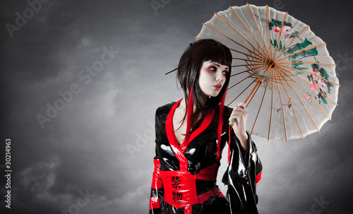 Modern style geisha in fetish kimono photo