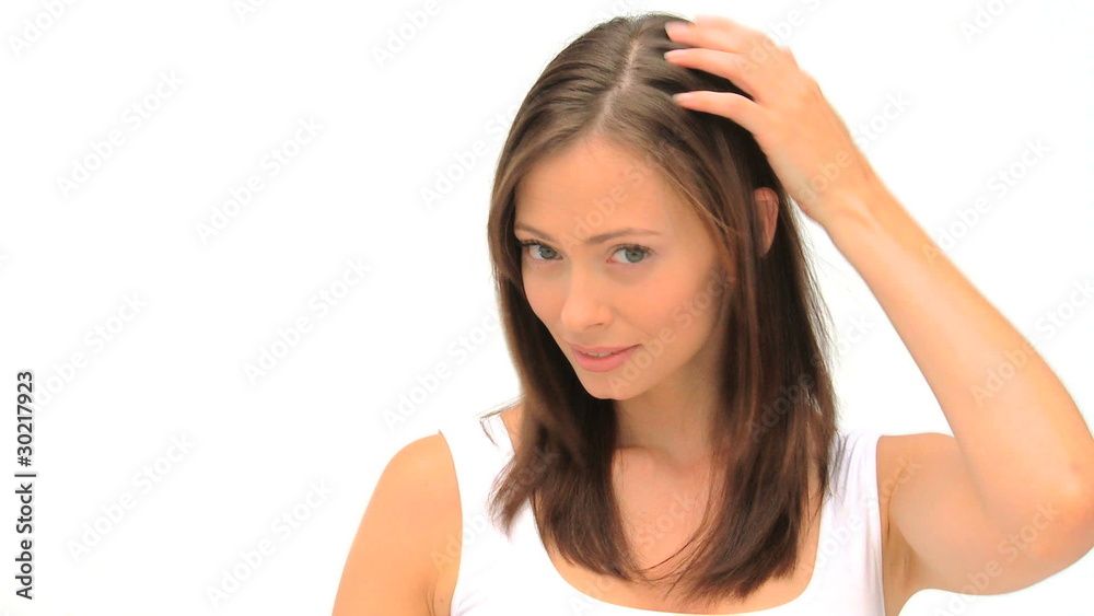 Woman fixing her hair Woman fixing her hair