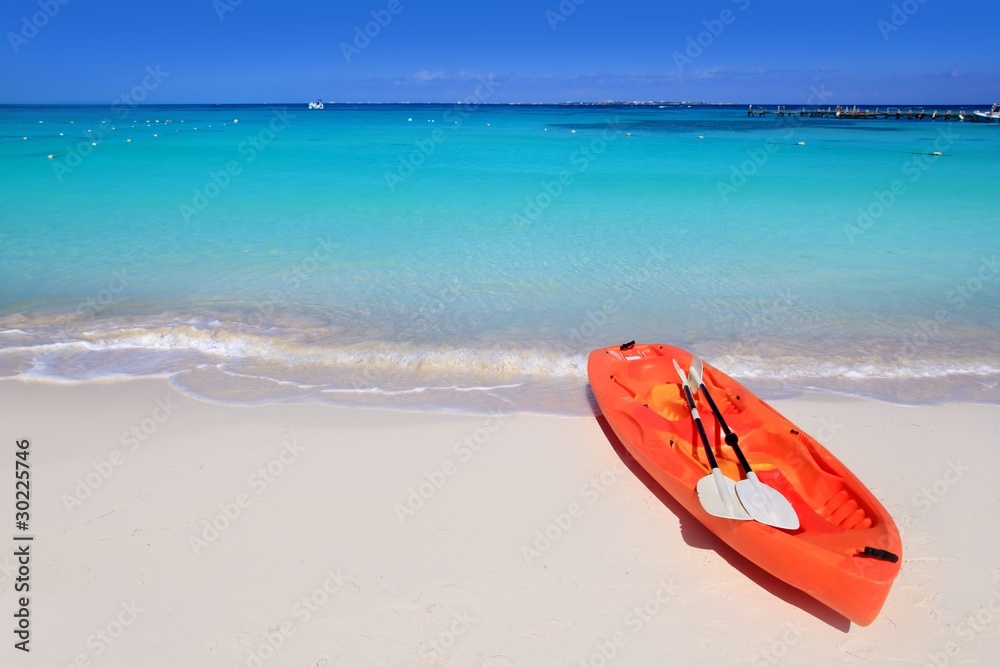 Kayak in beach sand caribbean sea turquoise Kayak in beach sand caribbean sea turquoise